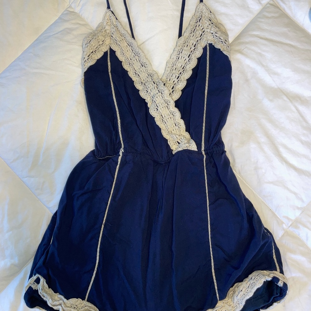 Cute open back lace blue romper! SIZE S.